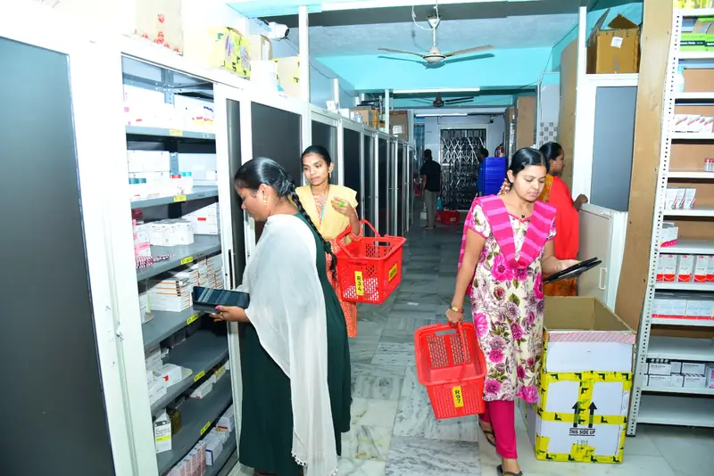 Staff picking orders from shelves